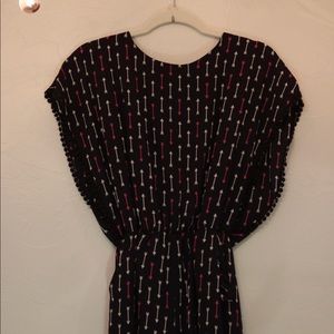 Navy romper with arrow print